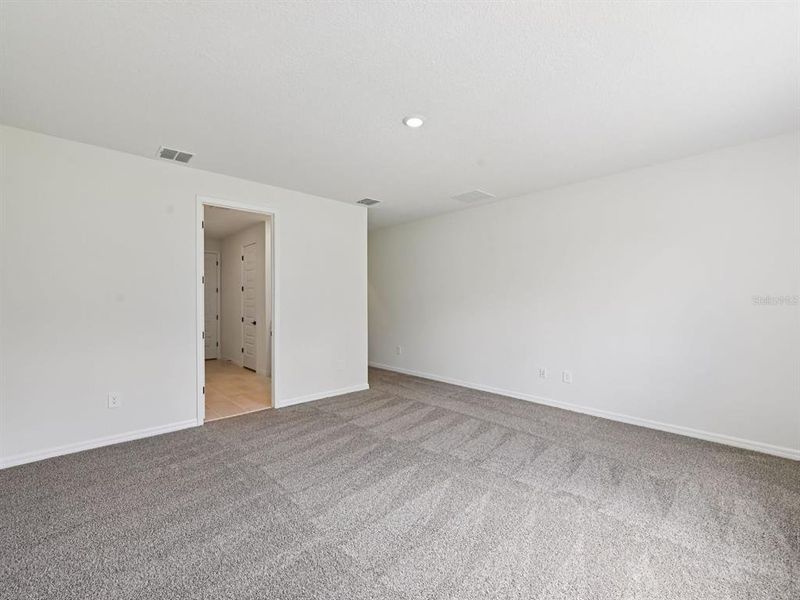 Spacious, unfurnished interior of a new home in Oakfield Trails - Premier Series, Parrish (Image 27).