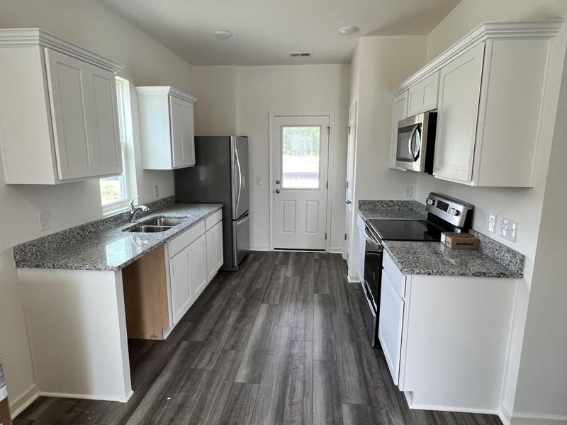 Furnished interior view inside a new home in Crossing at Givhans, Ridgeville (Image 5).