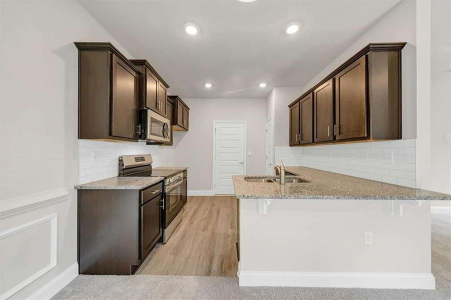 Furnished interior view inside a new home in Scarlett Place, Bowdon (Image 7).