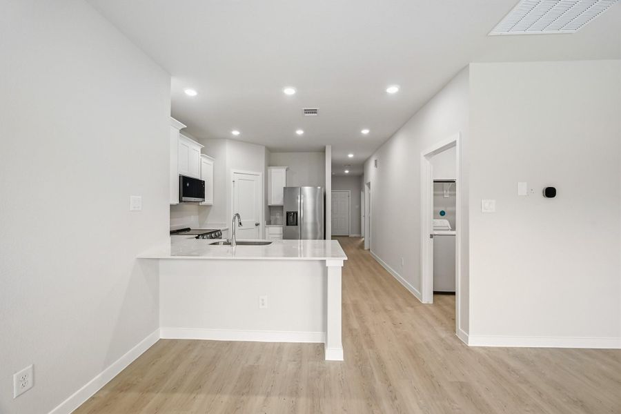 Furnished interior view inside a new home in Crockett Meadows, Conroe (Image 8).