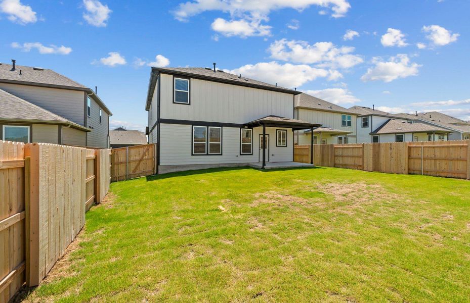 Front exterior of a new home in Patterson Ranch, Georgetown, TX, highlighting curb appeal (Image 1). Front exterior of a new home in Patterson Ranch, Georgetown, TX, highlighting curb appeal (Image 1).