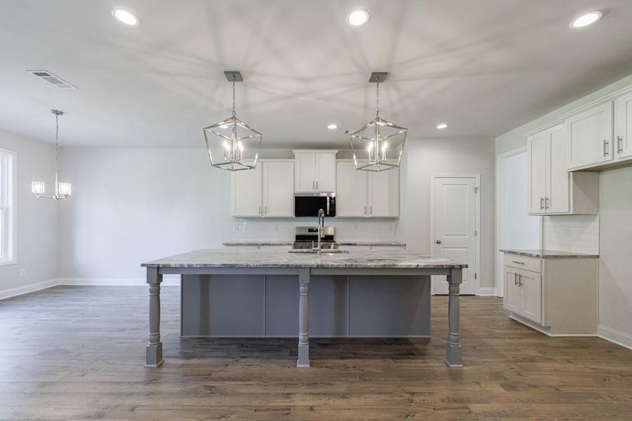 Furnished interior view inside a new home in , Buford (Image 6). Furnished interior view inside a new home in , Buford (Image 6).