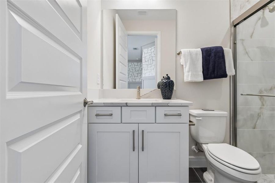 Furnished interior view inside a new home in Grand Park, Sarasota (Image 19).