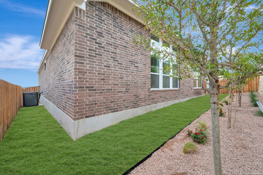 Exterior details and patio area of a home in Windsong - Legacy Series, Boerne (Image 3).