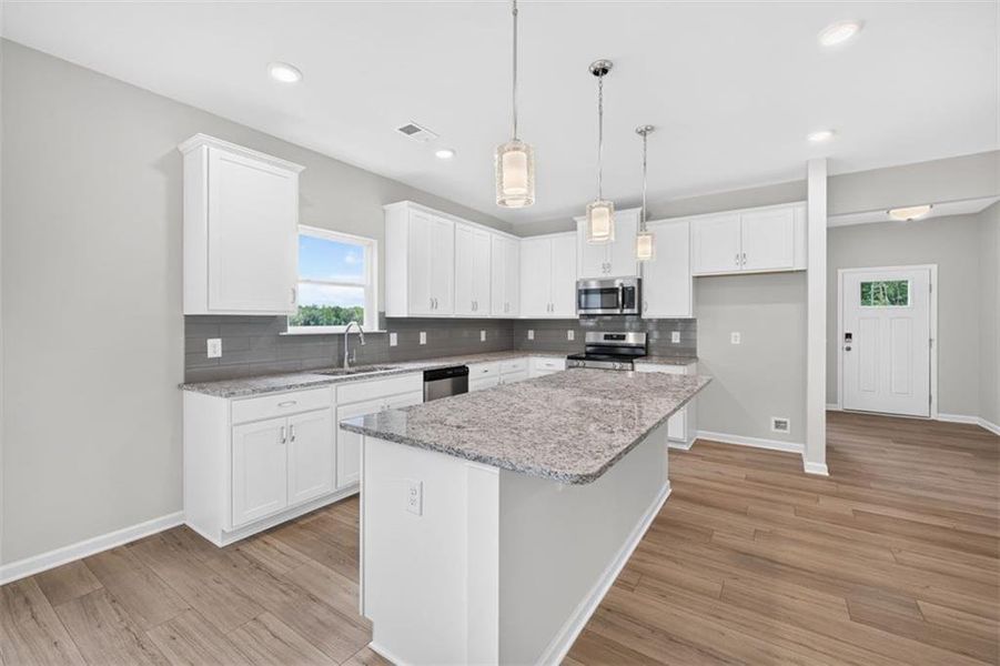 Furnished interior view inside a new home in Summerfield Place, Carrollton (Image 6).