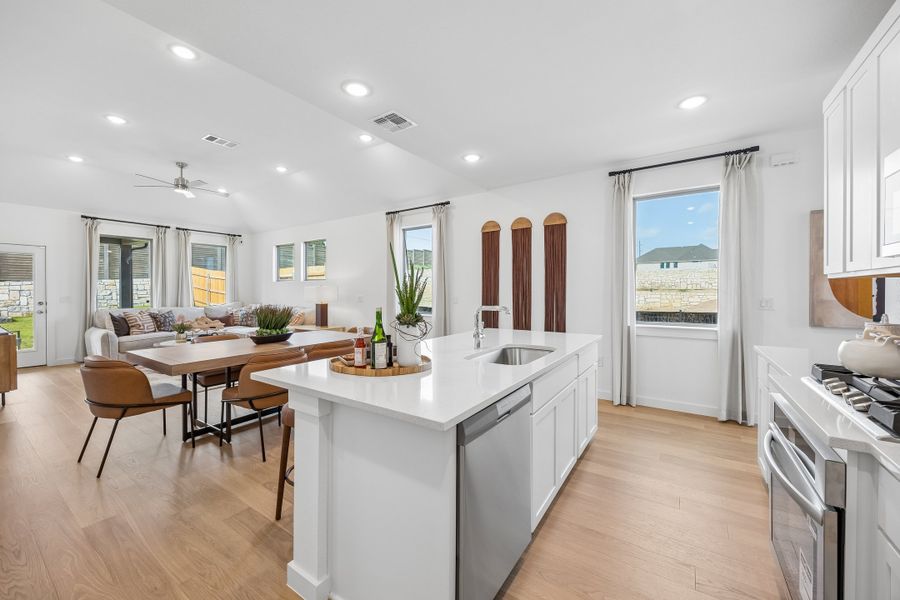 Kitchen in the Magnolia home plan by Trophy Signature Homes – REPRESENTATIVE PHOTO Kitchen in the Magnolia home plan by Trophy Signature Homes – REPRESENTATIVE PHOTO