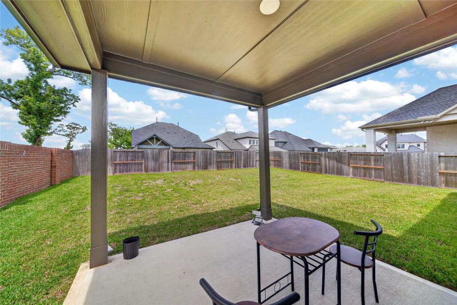Exterior details and patio area of a home in , Sienna Plantation (Image 21).