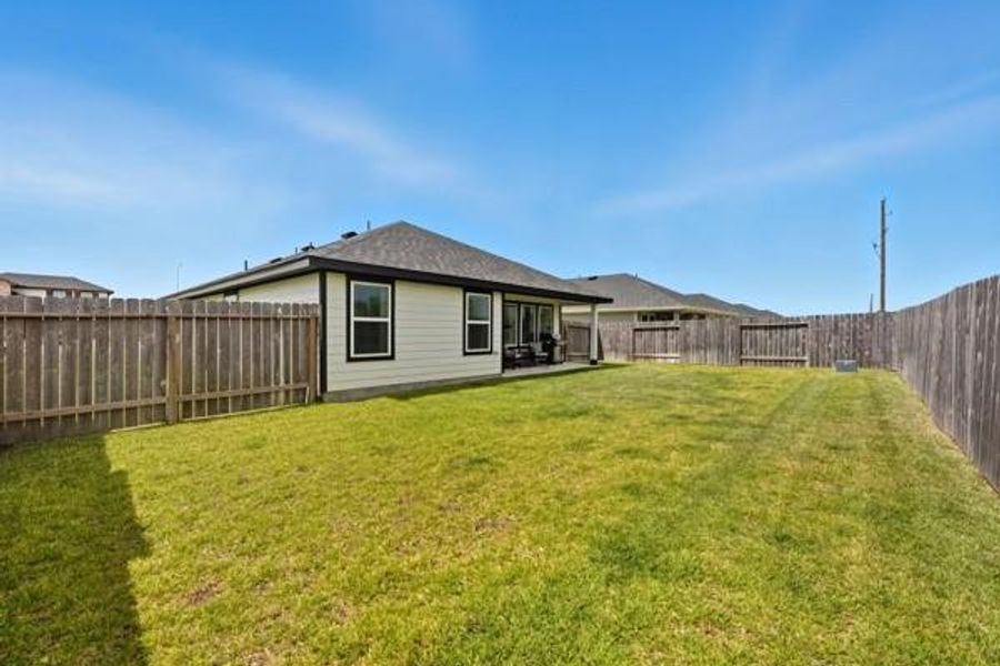Exterior details and patio area of a home in , Sealy (Image 1). Exterior details and patio area of a home in , Sealy (Image 1).