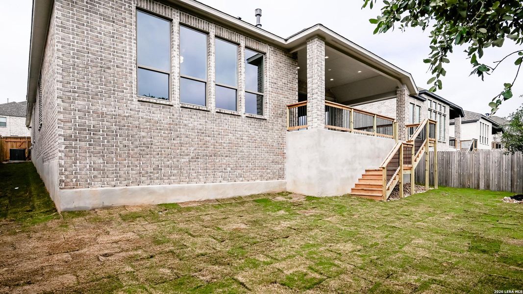Exterior details and patio area of a home in Johnson Ranch, Bulverde (Image 4).