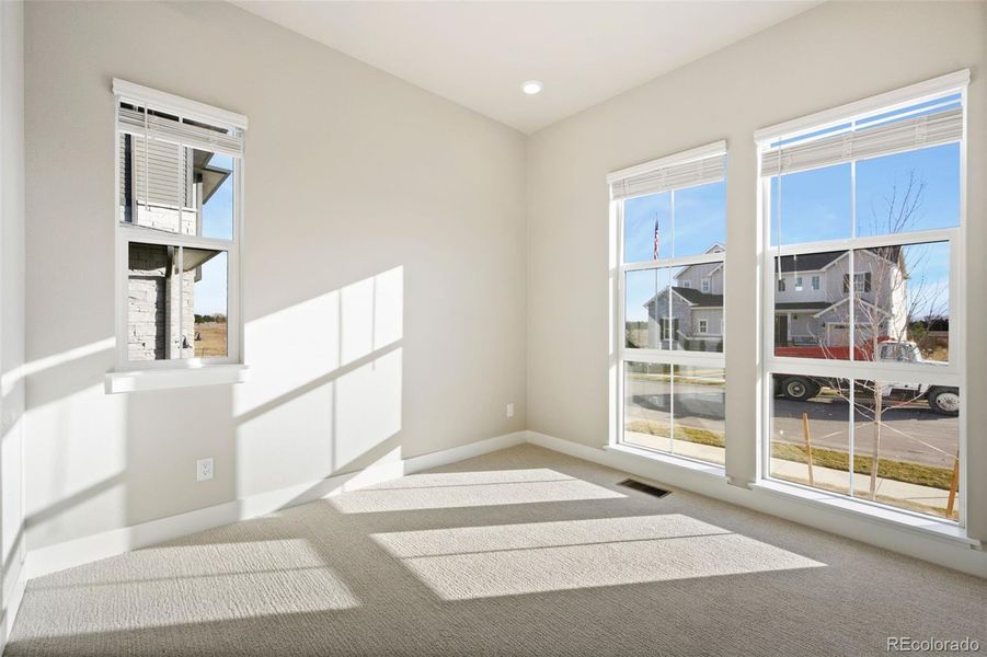 Spacious, unfurnished interior of a new home in Kitchel Lake at Serratoga Falls, Timnath (Image 12).