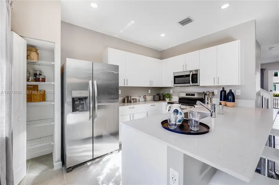 Furnished interior view inside a new home in Terra Sol, Homestead (Image 15).