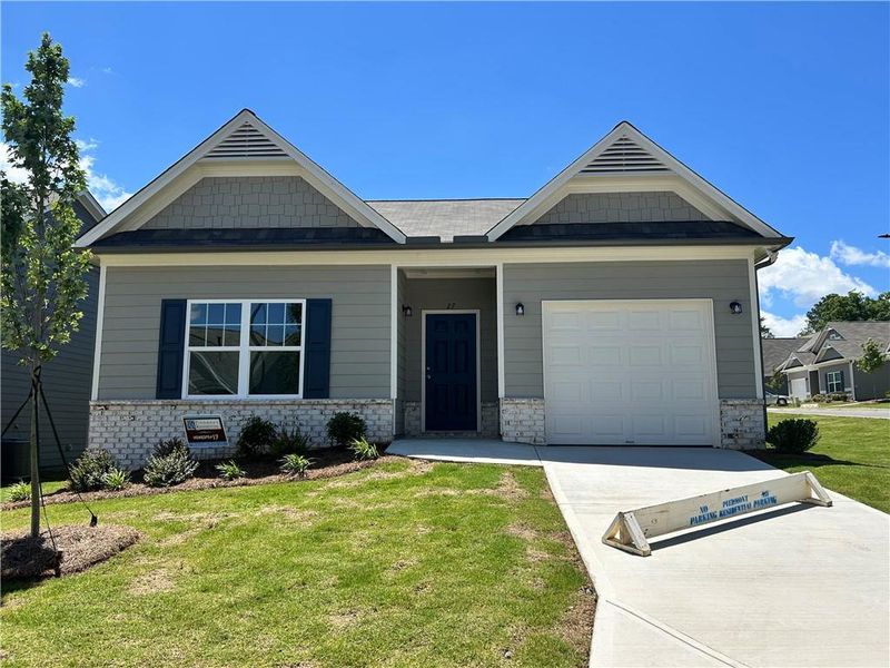 Front exterior of a new home in Villages at Cedar Hill, Dallas, GA, highlighting curb appeal (Image 1). Front exterior of a new home in Villages at Cedar Hill, Dallas, GA, highlighting curb appeal (Image 1).