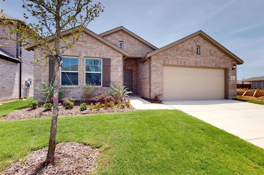 Front exterior of a new home in Sanderos, Fort Worth, TX, highlighting curb appeal (Image 25). Front exterior of a new home in Sanderos, Fort Worth, TX, highlighting curb appeal (Image 25).