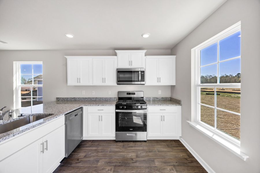 Furnished interior view inside a new home in The Park at Wilkinson, Orangeburg (Image 16). Furnished interior view inside a new home in The Park at Wilkinson, Orangeburg (Image 16).