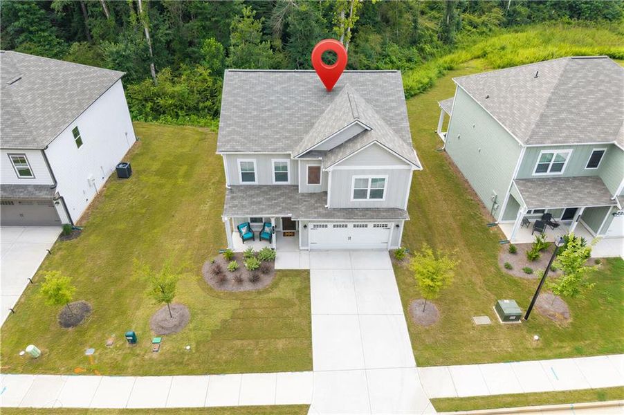 Front exterior of a new home in Morgan Landing, Carrollton, GA, highlighting curb appeal (Image 2). Front exterior of a new home in Morgan Landing, Carrollton, GA, highlighting curb appeal (Image 2).