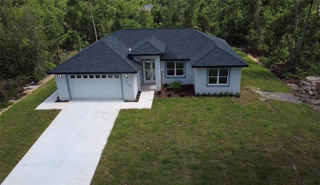 Front exterior of a new home in , Sebring, FL, highlighting curb appeal (Image 1). Front exterior of a new home in , Sebring, FL, highlighting curb appeal (Image 1).