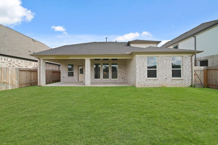 Front exterior of a new home in Morton Creek Ranch, Katy, TX, highlighting curb appeal (Image 2). Front exterior of a new home in Morton Creek Ranch, Katy, TX, highlighting curb appeal (Image 2).