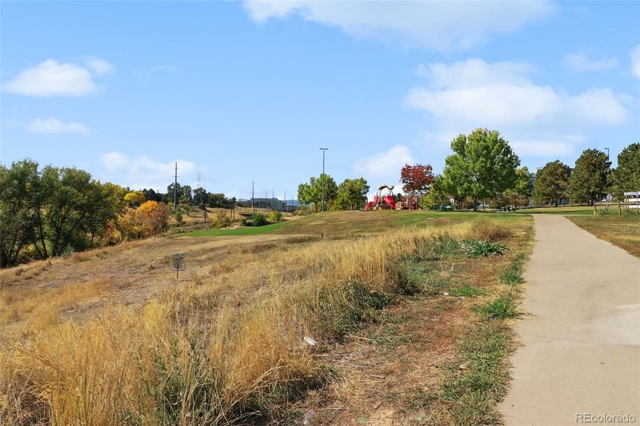 Located across the street from Netty Moore park and playground and Dry Gulch park with trail