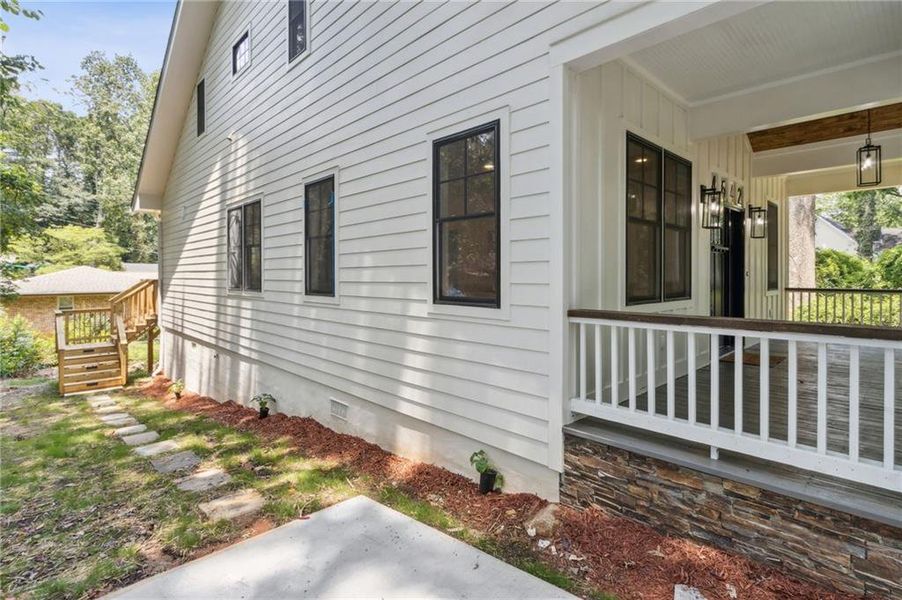 Exterior details and patio area of a home in , Pine Lake (Image 31).