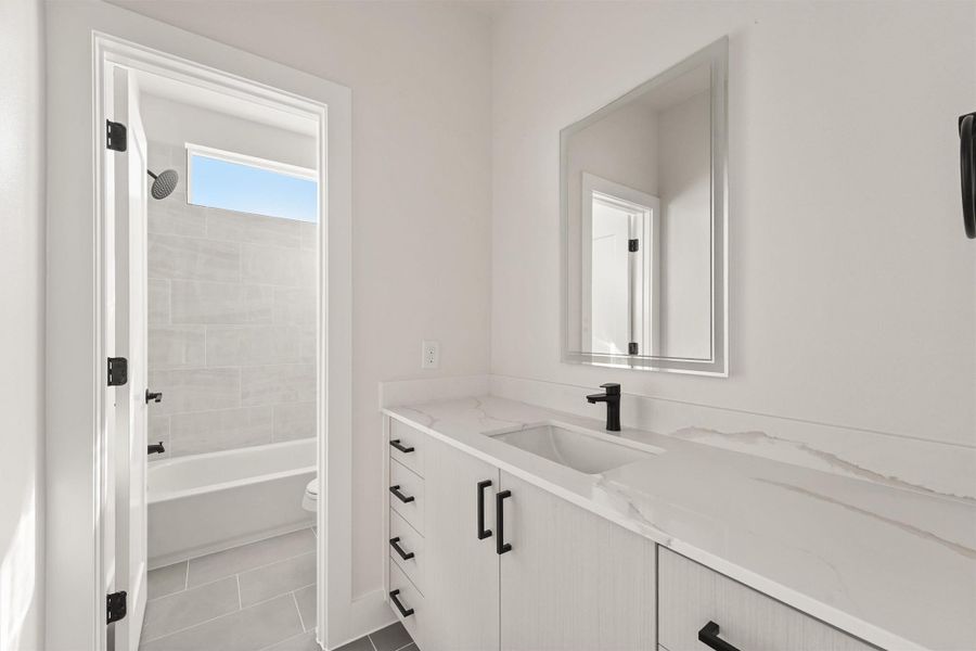 Furnished interior view inside a new home in Jesselton Square at Creekmont, Houston (Image 9). Furnished interior view inside a new home in Jesselton Square at Creekmont, Houston (Image 9).