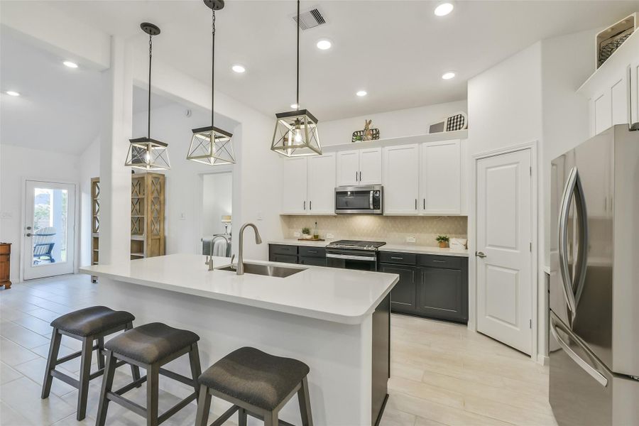 The breakfast bar easily accommodates 3 or 4 stools. Perfect for homework or snacktime!