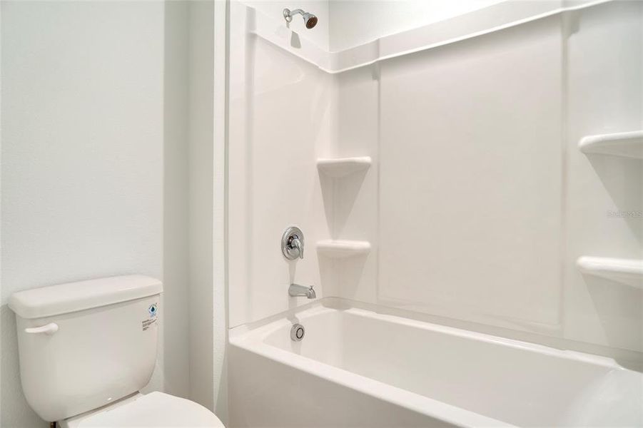 Furnished interior view inside a new home in Solara Resort, Kissimmee (Image 40).