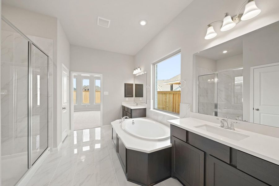 Furnished interior view inside a new home in Bridgeland 55', Cypress (Image 12).