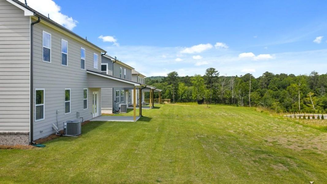 Front exterior of a new home in Hamptons at Riverwood East, Dallas, GA, highlighting curb appeal (Image 28).