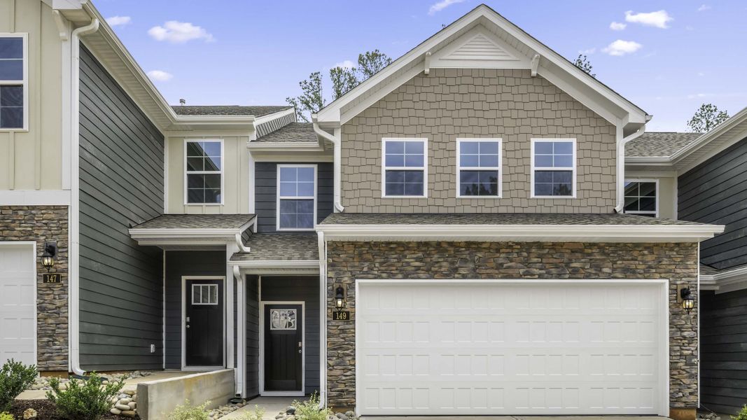 Front exterior of a new home in Lybrook Village, Advance, NC, highlighting curb appeal (Image 1). Front exterior of a new home in Lybrook Village, Advance, NC, highlighting curb appeal (Image 1).