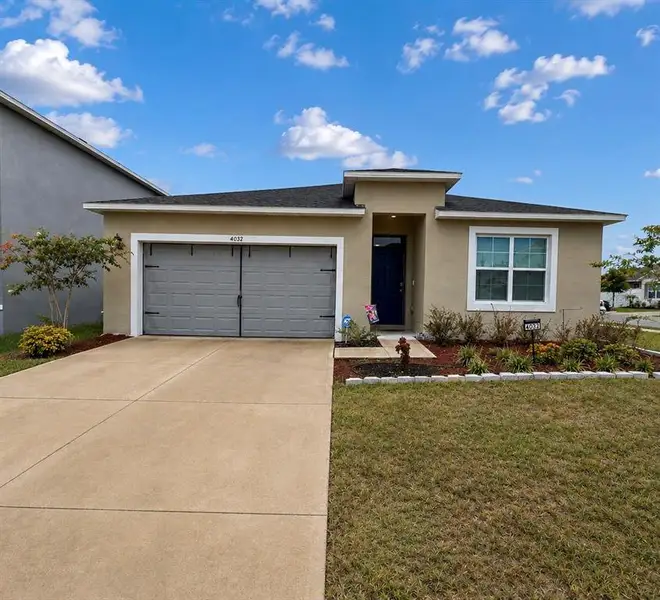 Front exterior of a new home in , Bartow, FL, highlighting curb appeal (Image 1). Front exterior of a new home in , Bartow, FL, highlighting curb appeal (Image 1).