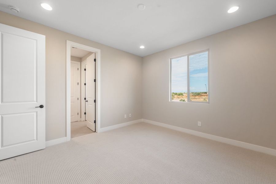 Spacious, unfurnished interior of a new home in Legado West, Queen Creek (Image 30).