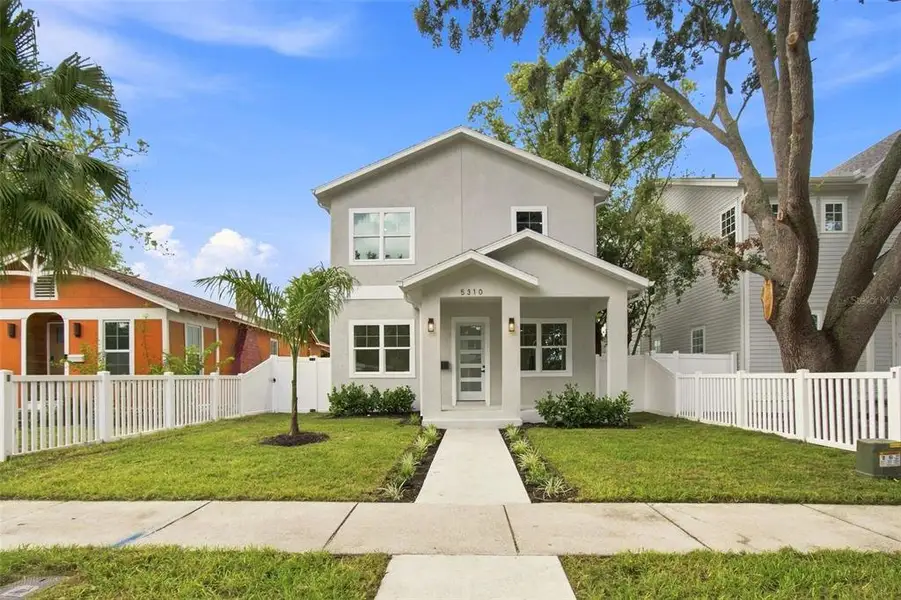 Front exterior of a new home in , St. Petersburg, FL, highlighting curb appeal (Image 2). Front exterior of a new home in , St. Petersburg, FL, highlighting curb appeal (Image 2).