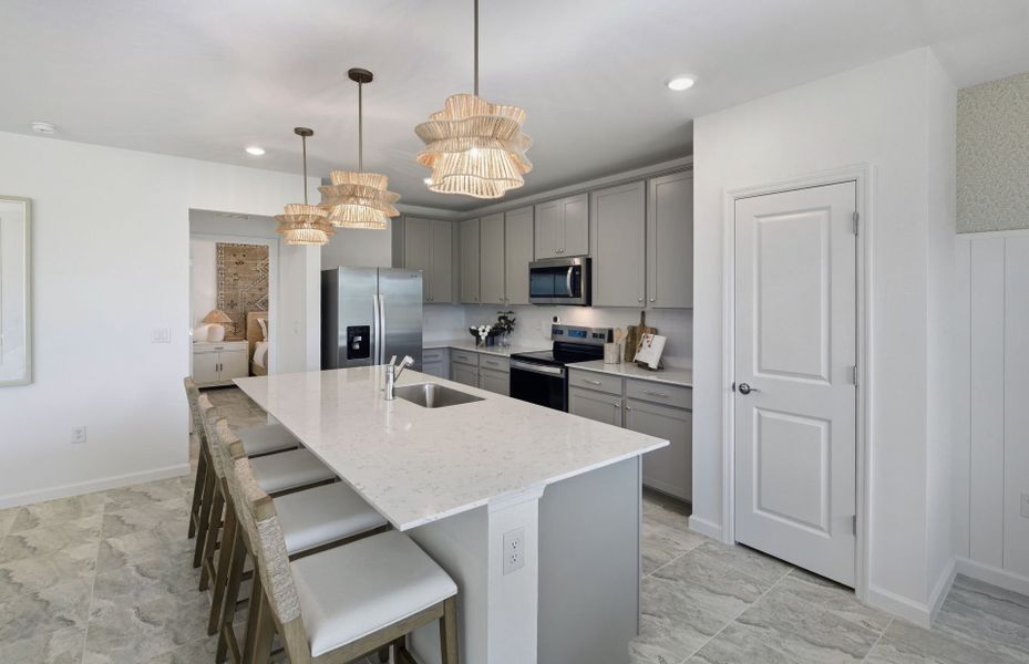Representative furnished interior of a home built from the Tybee by Pulte Homes in Lakespur Wellen Park, Venice (Image 16).