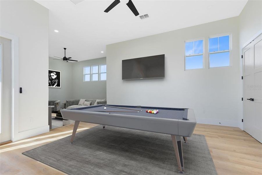 This photo has been virtually staged. On the second floor is a huge game room!