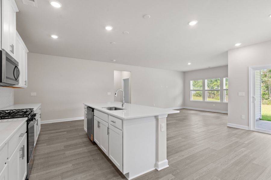 Furnished interior view inside a new home in Cypress Ridge - The Coastline Series, Longs (Image 5).