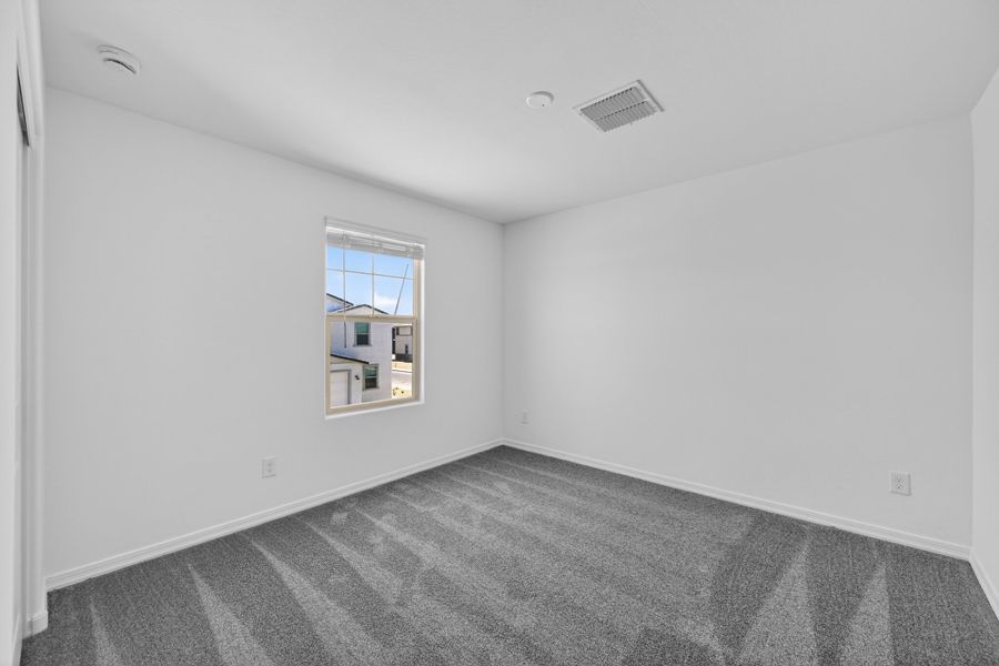 Spacious, unfurnished interior of a new home in Artisan at Asante, Surprise (Image 23).
