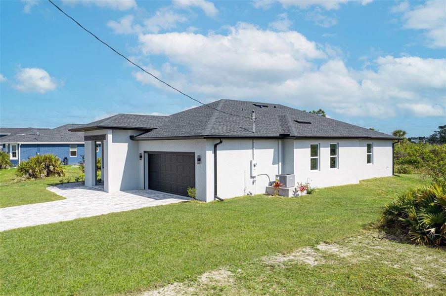Front exterior of a new home in , Rotonda West, FL, highlighting curb appeal (Image 28).