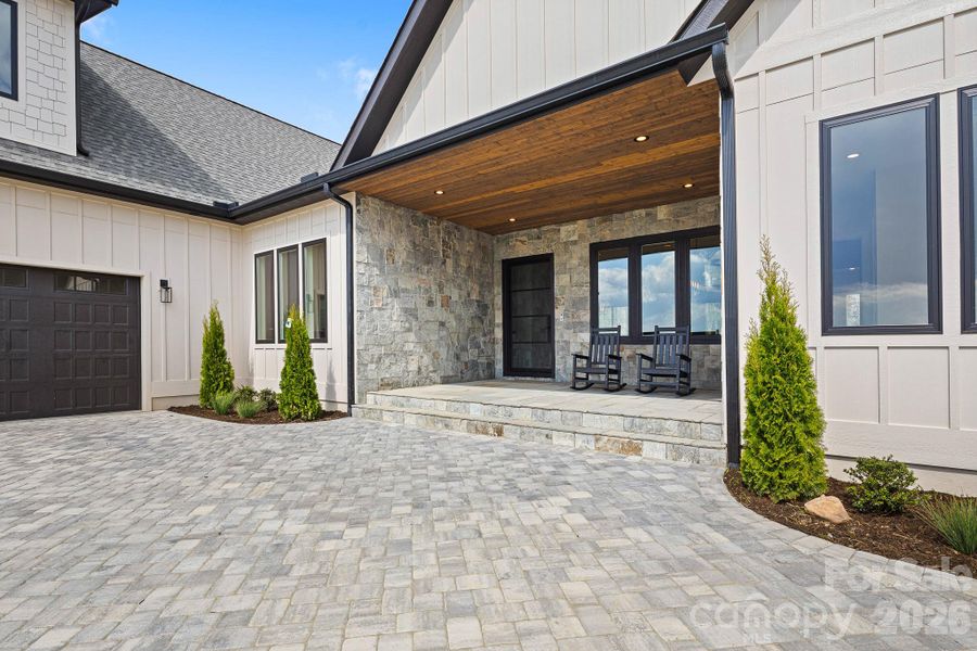 Exterior details and patio area of a home in , Fletcher (Image 33).