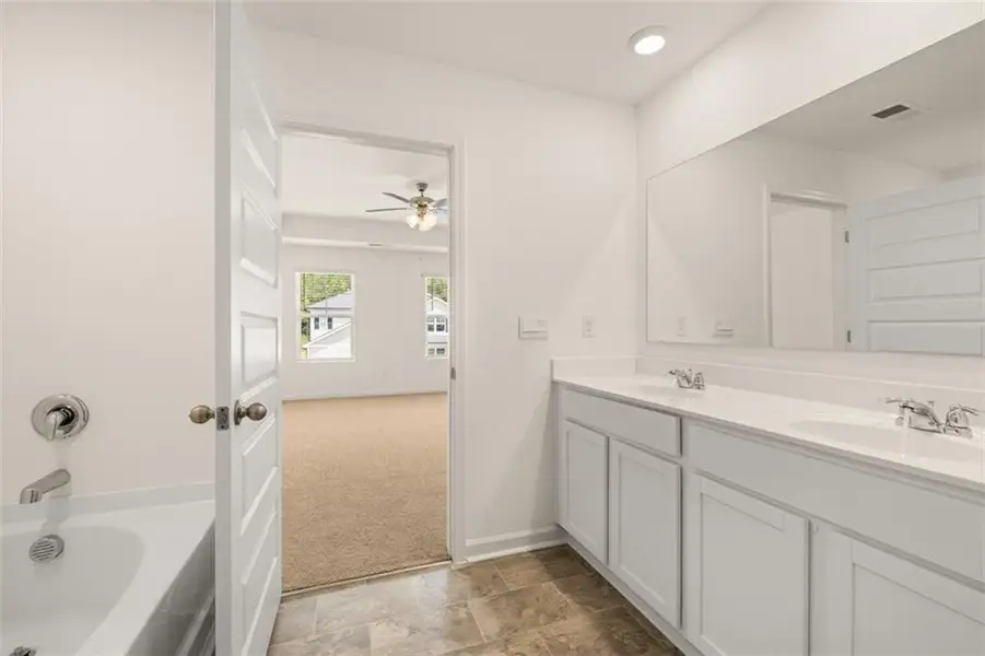 Furnished interior view inside a new home in Champion's Run, Lithonia (Image 10).