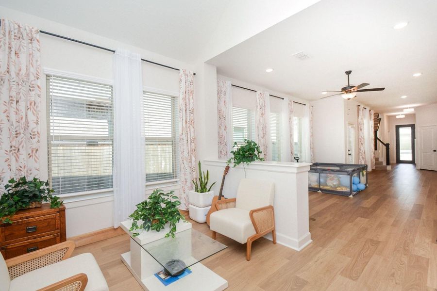 Furnished interior view inside a new home in Prairieland Village - Grove Collection, Cypress (Image 7).