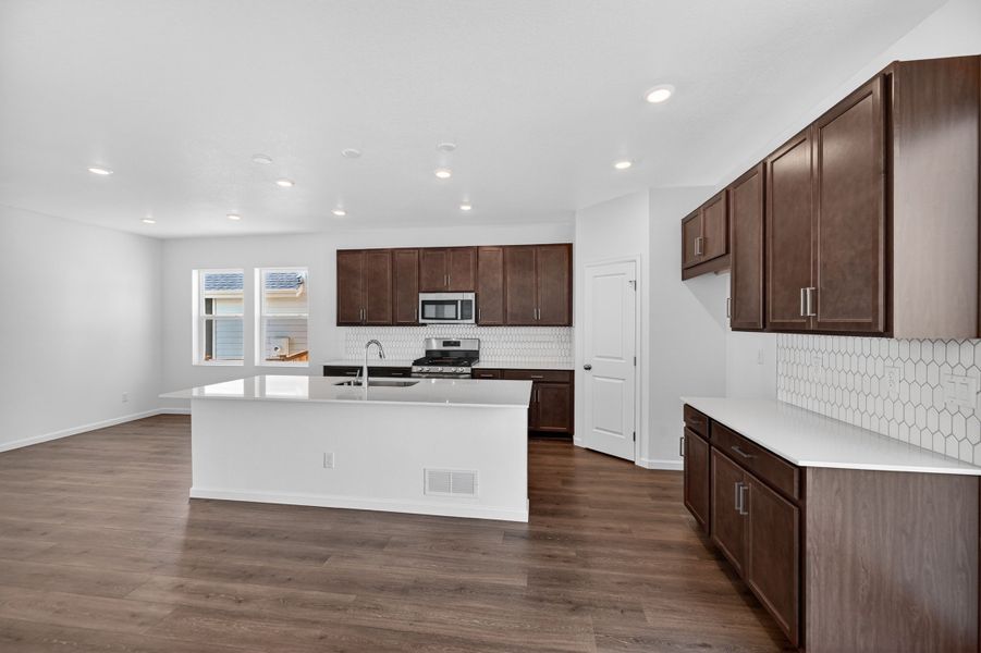 Furnished interior view inside a new home in Sky Ranch, Aurora (Image 3).