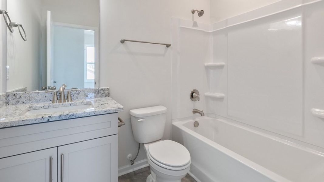 Furnished interior view inside a new home in The Manors at Winston Pointe, Clayton (Image 8).