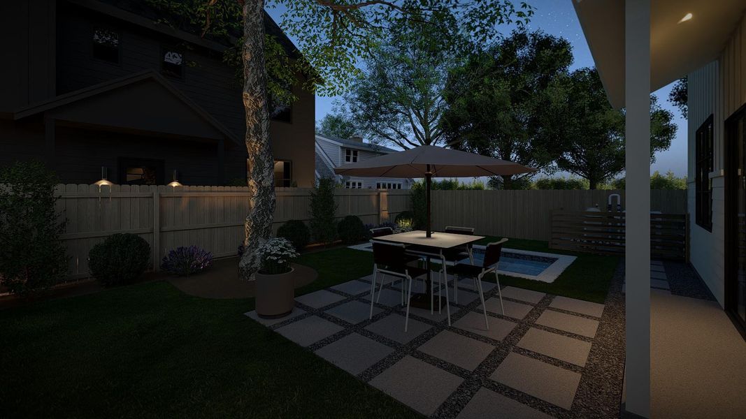 Outdoor living area featuring a paved patio, perimeter fencing, mature trees, and a small built-in pool