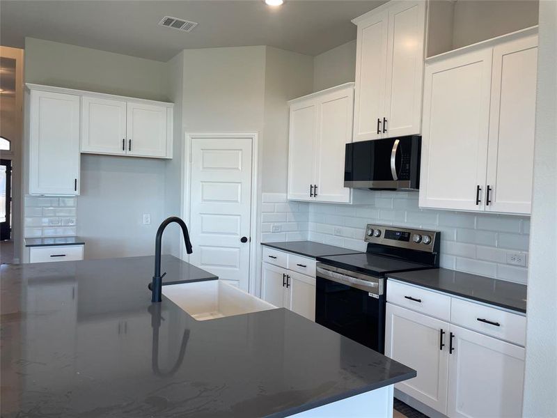 Furnished interior view inside a new home in Mercer Meadows, Royse City (Image 8). Furnished interior view inside a new home in Mercer Meadows, Royse City (Image 8).