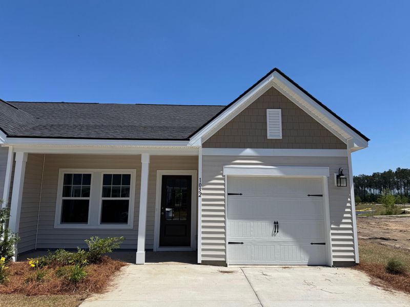 Front exterior of a new home in , Summerville, SC, highlighting curb appeal (Image 18).