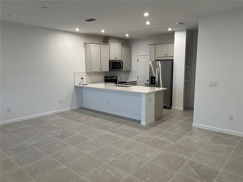 Furnished interior view inside a new home in Meridian Parks, Orlando (Image 14).