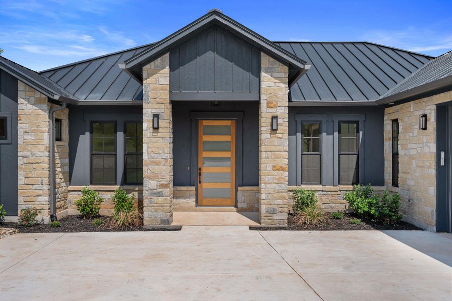 Front exterior of a new home in , Horseshoe Bay, TX, highlighting curb appeal (Image 19).