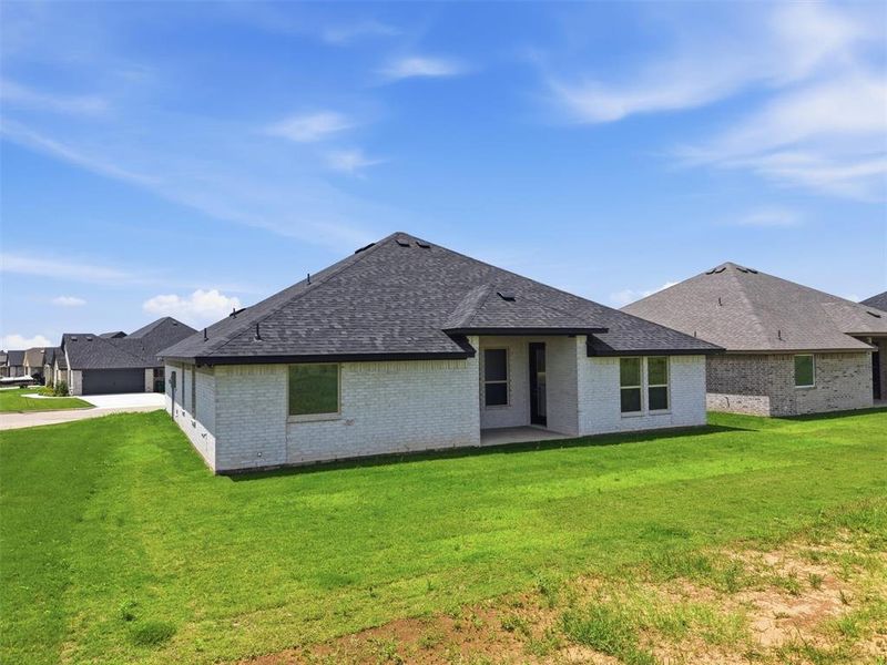 Exterior details and patio area of a home in , Tolar (Image 23).