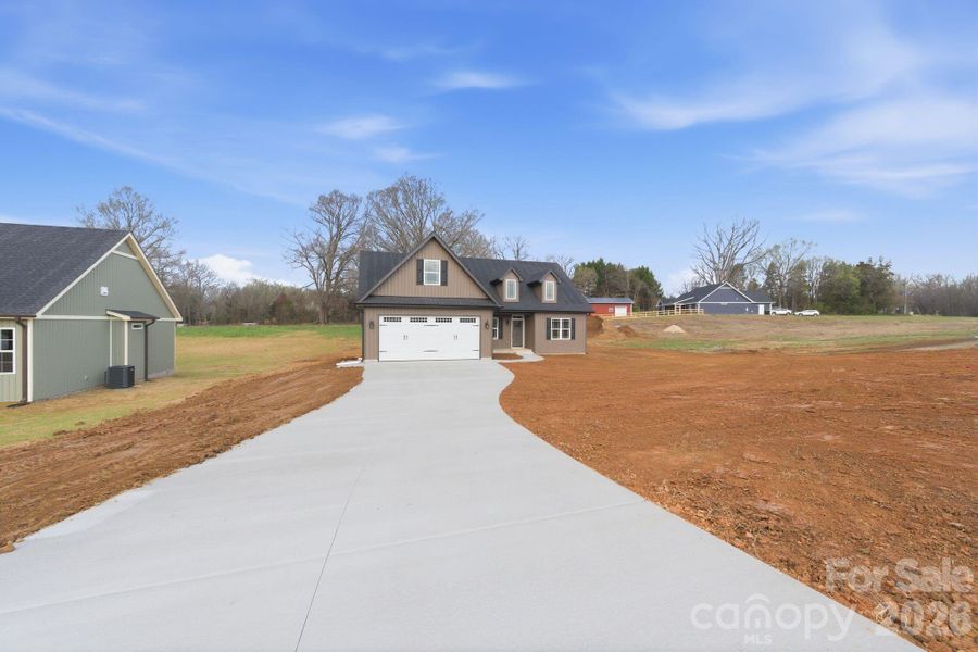 Front exterior of a new home in , Winston-Salem, NC, highlighting curb appeal (Image 25).