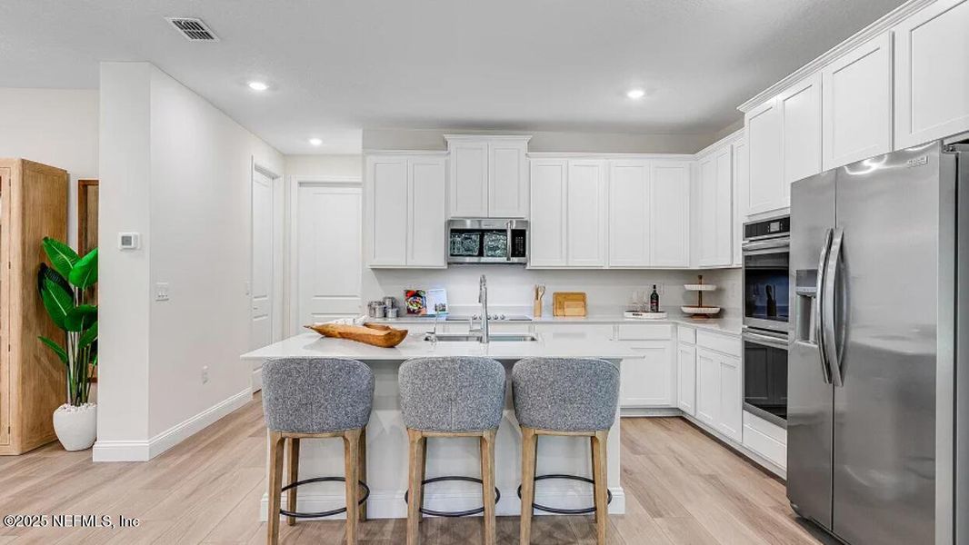 Furnished interior view inside a new home in Russell Retreat, Green Cove Springs (Image 19).